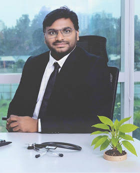 Dr Tinnu George